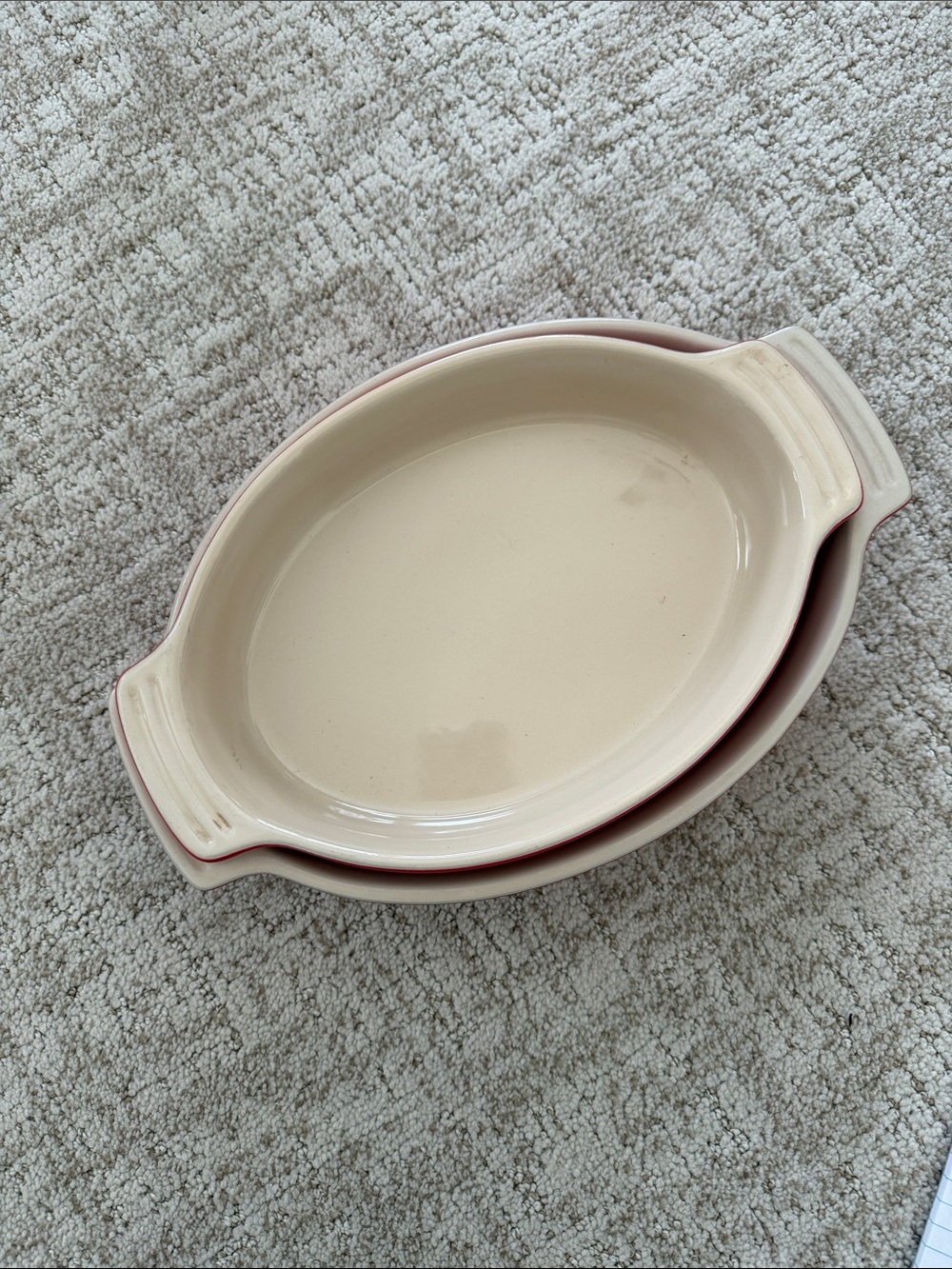 Le Creuset stoneware set  of 2 Dune Oval dishes. 12.5/11.25